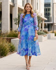 Mia | Blumiges Midi-Kleid mit langen Ärmeln für Hochzeitsgäste